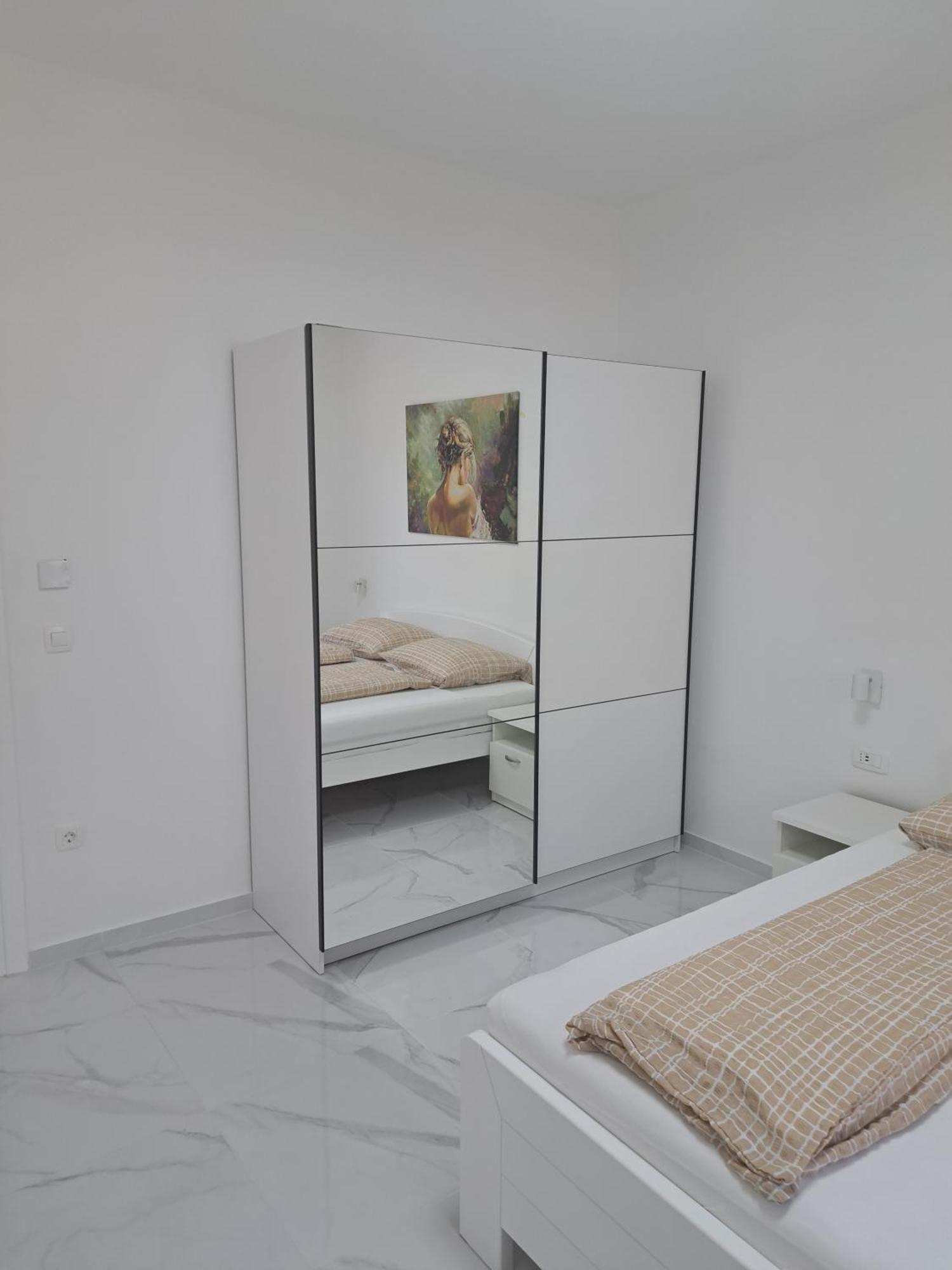 Apartmani Totic Malinska Buitenkant foto