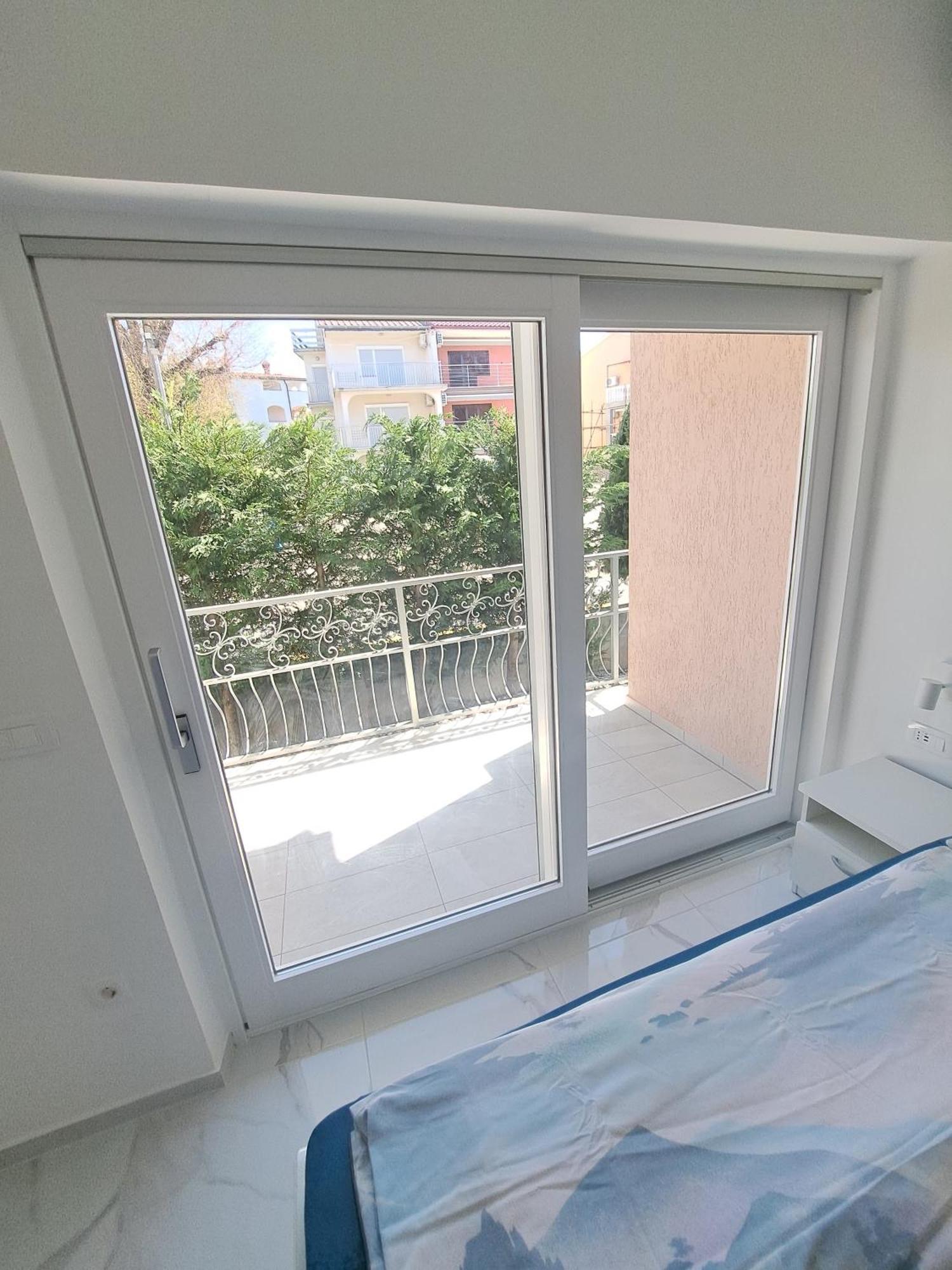 Apartmani Totic Malinska Buitenkant foto