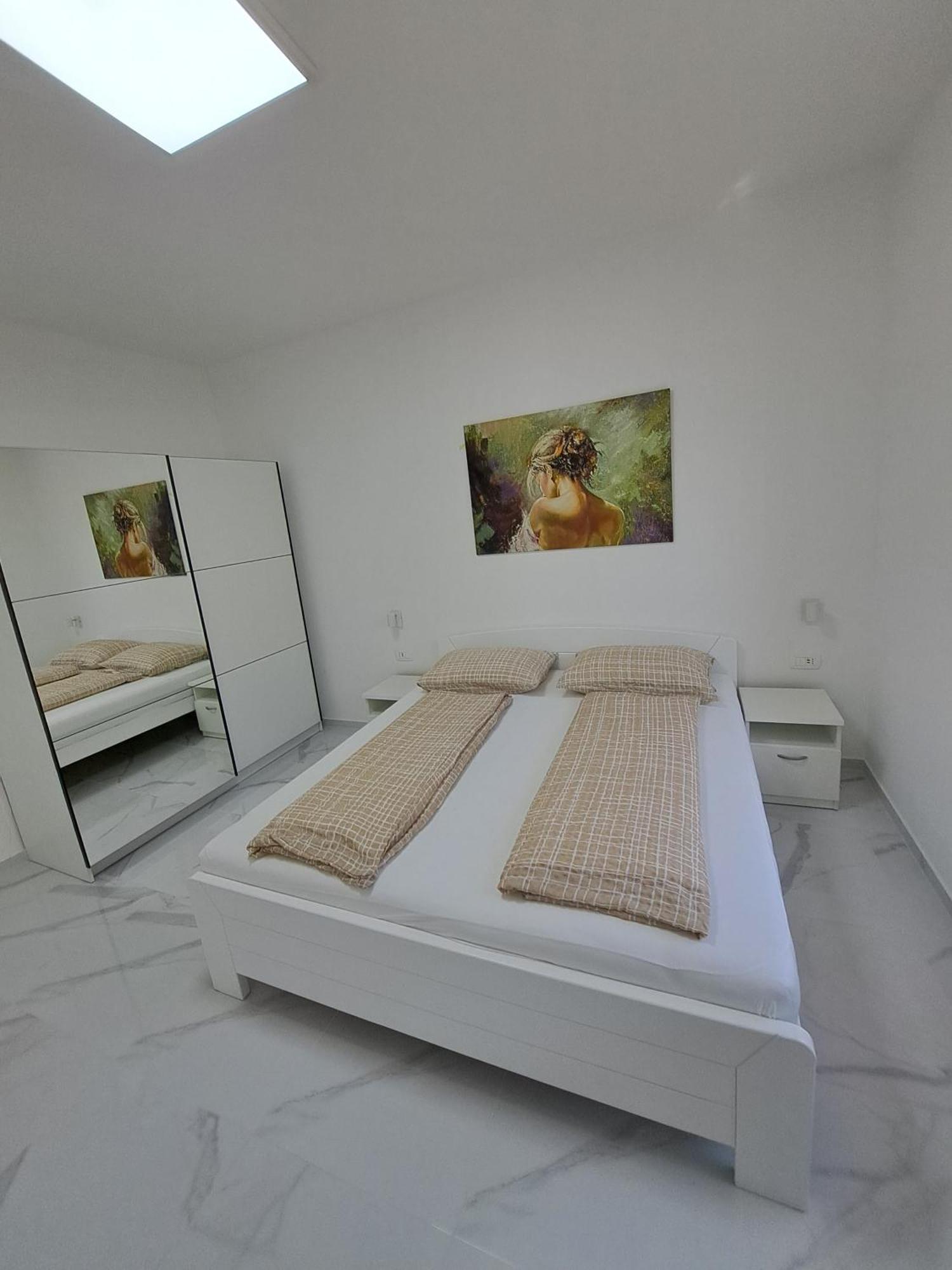 Apartmani Totic Malinska Buitenkant foto
